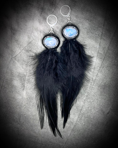 Mystical handmade black crystal earrings for her.  Handmade black feather and moonstone dangle earrings on sterling silver hooks.