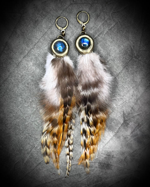 Flashy labradorite crystal and feather handmade earrings with brass huggie ear hooks in gold for bohemian, vintage inspired festival jewelry. 