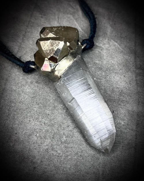 Handmade crystal healing talisman for manifestation!  Lemurian light crystal and pyrite for the gift of power and spiritual elevation.  