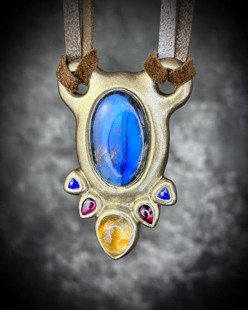 Made in the USA Handmade designer blue flashy labradorite multistone crystal pendant with citrine, garnet and lapis lazuli in a gold finish on metallic leather. Perfect for cosplay, holiday gifting or festival jewelry!