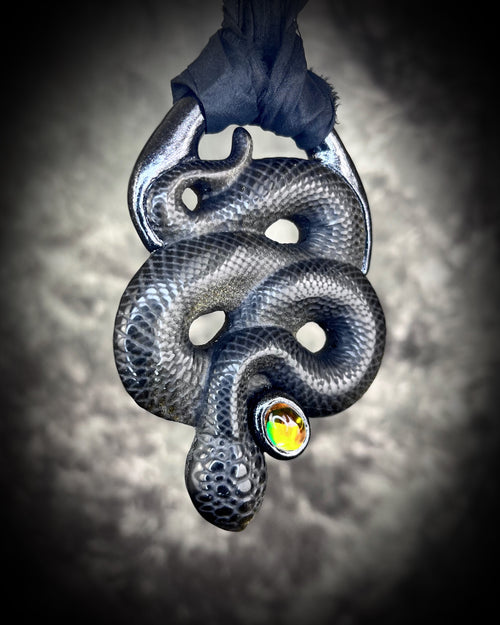 Handmade witchy designer snake serpent gold sheen obsidian crystal talisman with glowing citrine gemstone and recycled silk for an eco-friendly and sustainable elegance. 