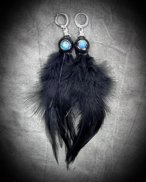 Mystical handmade black crystal earrings for her.  Handmade black feather and moonstone dangle earrings on sterling silver hooks.