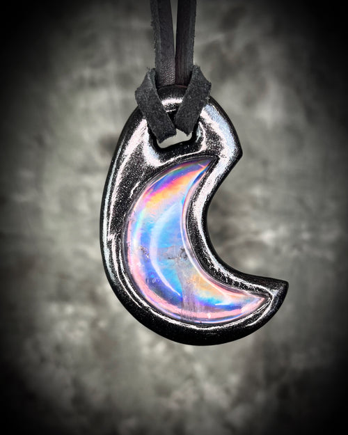 David Bowie inspired rock and roll handmade designer quartz crystal crescent moon necklace with black rainbow. Black finish on black leather. Queer, Transgender, Non-Binary jewelry!